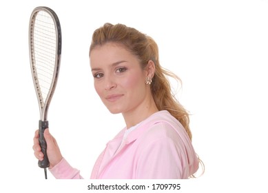 Lovely girl holding a tennis racket