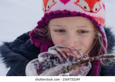 Lovely Girl Licking Frozen Icicle