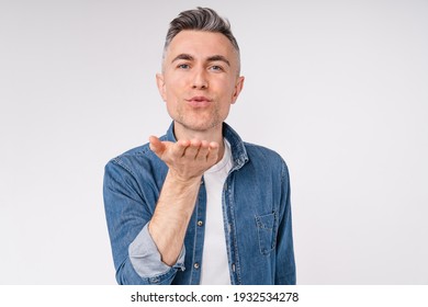 Lovely Handsome Caucasian Man Sending Kisses Isolated Over White Background