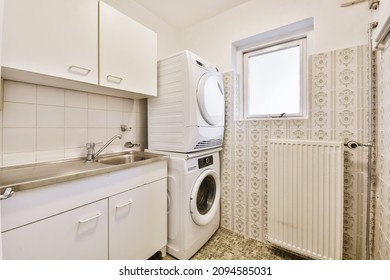 Lovely Kitchen With Laundry Area With Washing Machine