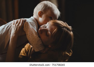 Lovely mom holds her little son - Shutterstock ID 751758265