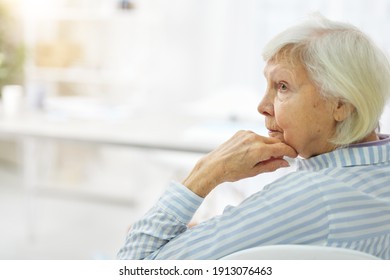 Lovely Old Woman Resting Her Chin On Hand