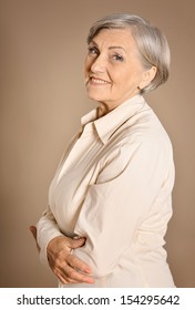 Lovely Old Woman Smiling Isolated In Studio