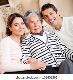 Lovely portrait of a grandmother with her family at home