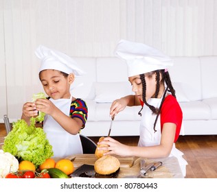 Lovely School Aged Siblings Making Sandwich