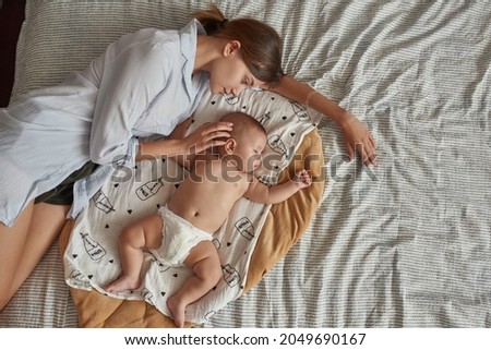 Man looking his wife and son