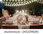 lovely Table setting for magnificent composition from flowers at a wedding , Centerpiece white and orange color palette flower bouquet arrangement