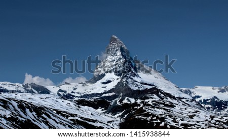 Similar – Matterhorn in clouds