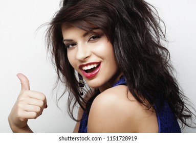 lovely woman showing victory or peace sign over white background - Shutterstock ID 1151728919