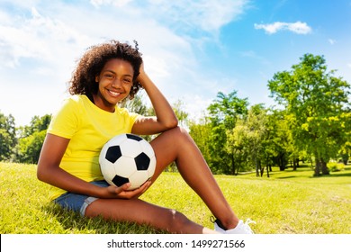 Lovely Young Black Curly Girl With Football Ball