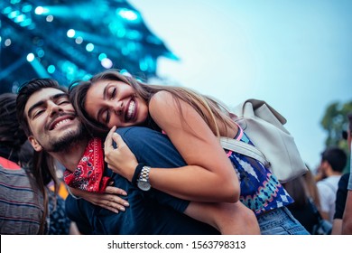 Lovely Young Couple Enjoying A Concert Together