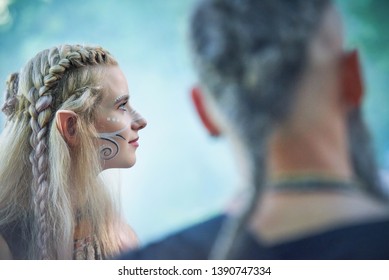Lovely young girl elf with long ears in the forest