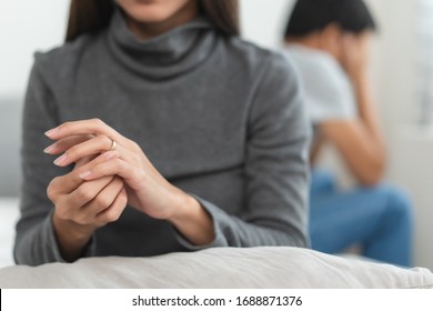 Lover couple relationship problems. Sad young wife sitting on the bed back to back from husband after argument and thinking about break up. - Powered by Shutterstock