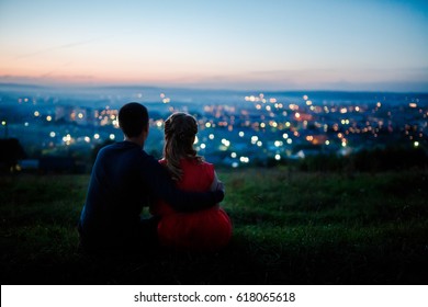 Lovers Against Background Of Night City, Starry Sky And Horizon. Concept Is Romantic Date, First Love