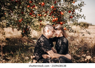 Lovers in the apple orchard 