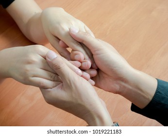 Lovers join hands with love.Valentineâ??s day concept.
