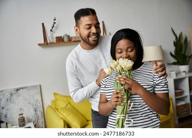 A loving African American couple shares a sweet moment at home. - Powered by Shutterstock