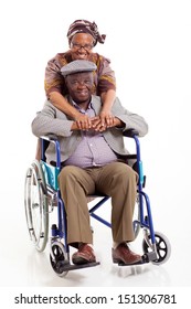 loving african wife hugging disabled husband on white background