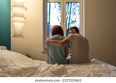 Loving caring man calms down hug embrace upset wife after quarrel. Support in family. Depressed woman need mental help from trouble emotional burnout. Sad couple in trust relations go through crisis - Shutterstock ID 2327025863