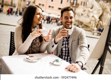 Loving Couple Drinking Coffee In Rome, Italy