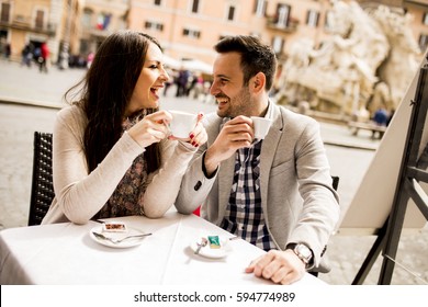 Loving Couple Drinking Coffee In Rome, Italy