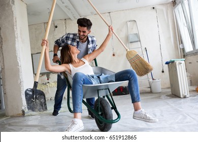 Loving Couple Is Having Fun While They Are Renovating Home