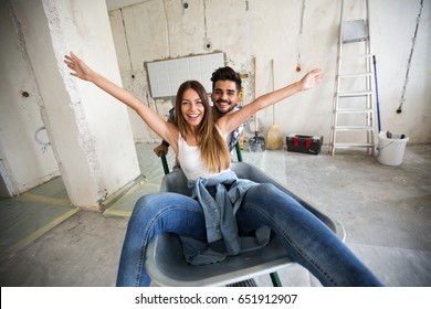 Loving Couple Is Having Fun While They Are Renovating Home