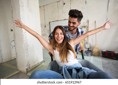 Loving Couple Is Having Fun While They Are Renovating Home