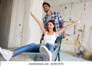 Loving couple is having fun while they are renovating home - Shutterstock ID 651912976