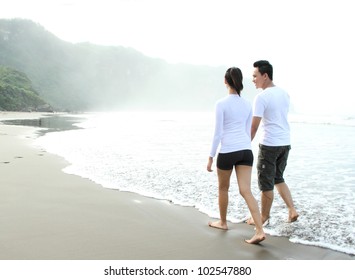 Loving Couple Spending Quality Time With Each Other On Beach