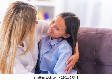 Loving Daughter Embraces Her Mother, A Mother Enjoys A Moment Of Tenderness With Her Eyes Closed, Feels Deep Love For Her Beloved Child, Family Maternal Support, Adoption Of A Child.