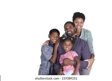 Loving family embracing each other isolated on a white background
