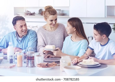 Loving Family Reuniting During Delicious Meal Time