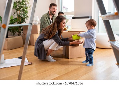 Loving Family In Their Fresh New Home Just Moving In