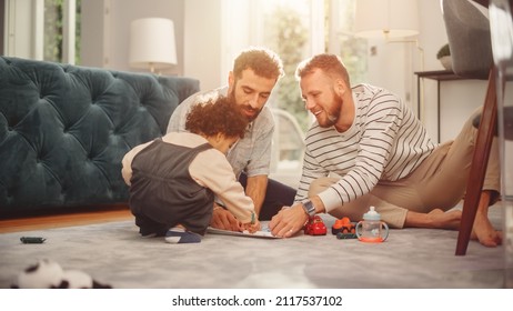 Loving LGBTQ Family Playing with Toys with Adorable Baby Boy at Home on Living Room Floor. Cheerful Gay Couple Nurturing a Child. Concept of Diverse Childhood, New Life, Parenthood.