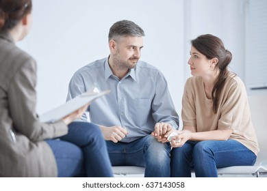 Loving Married Couple Making Up On A Marriage Therapy