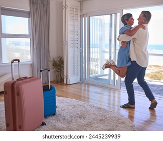 Loving Mature Couple With Luggage Arriving In Beachfront House Overlooking Ocean For Summer Vacation - Powered by Shutterstock