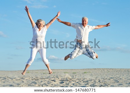 loving mature couple on a background of clear sky