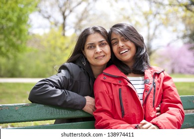 loving mother and daughter enjoying in park