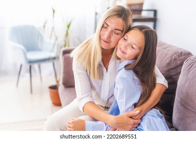 Loving Mother Embraces Her Daughter, A Mother Enjoys A Moment Of Tenderness With Her Eyes Closed, Feels Deep Love For Her Sweet Child, Family Maternal Support, Adoption Of A Child.