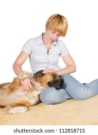 Loving Woman With Her Large Gentle Crossbreed Dog Lying With Its Head On Her Lap Stroking It