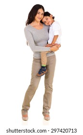 loving young indian mother holding her son on white background