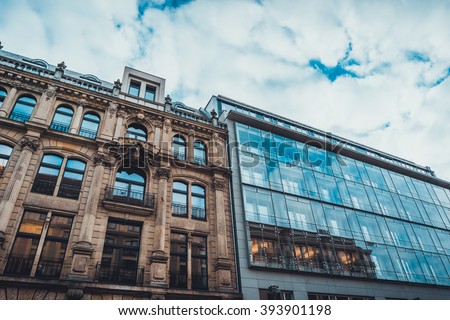 Low Angle Architectural View of Old and New Buildings in Urban Berlin, Germany - Low Rise Commerical Office Buildings in Contrasting Classical and Modern Designs