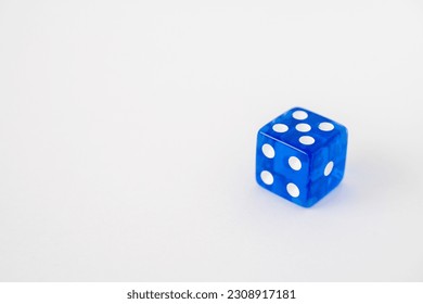 Low angle blue dice on white background - Powered by Shutterstock