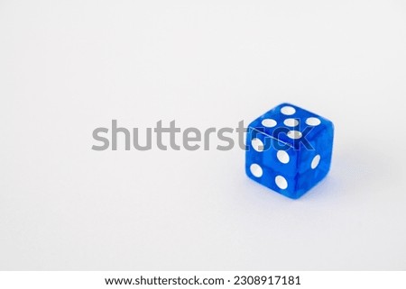 Low angle blue dice on white background
