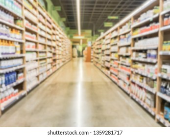 Low Angle Blurred Abstract Vitamin And Supplement Department At Grocery Store In America