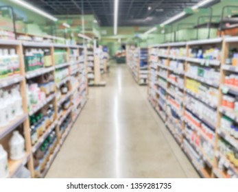 Low Angle Blurred Abstract Vitamin And Supplement Department At Grocery Store In America