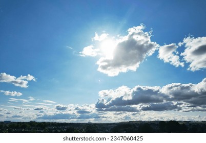 Low Angle Camera Footage of Dramatic Clouds and Blue Sky over The Luton City of England UK. August 6th, 2023 - Powered by Shutterstock