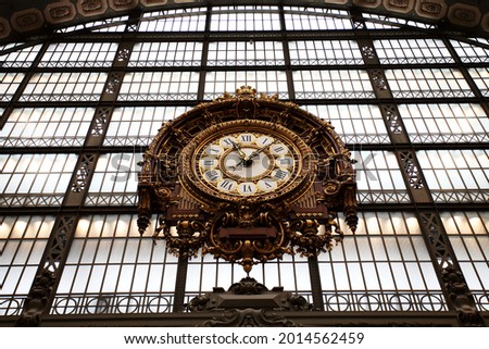 A low angle of the Musee d'Orsay Clock in Paris, France