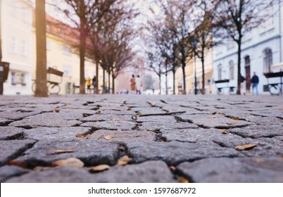 Low Angle Of Paving Stone Vintage Road Cover With Old Houses, Antique Street